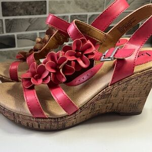 Size 8 brand new BOC pink cork wedge strap sandals with flower design.